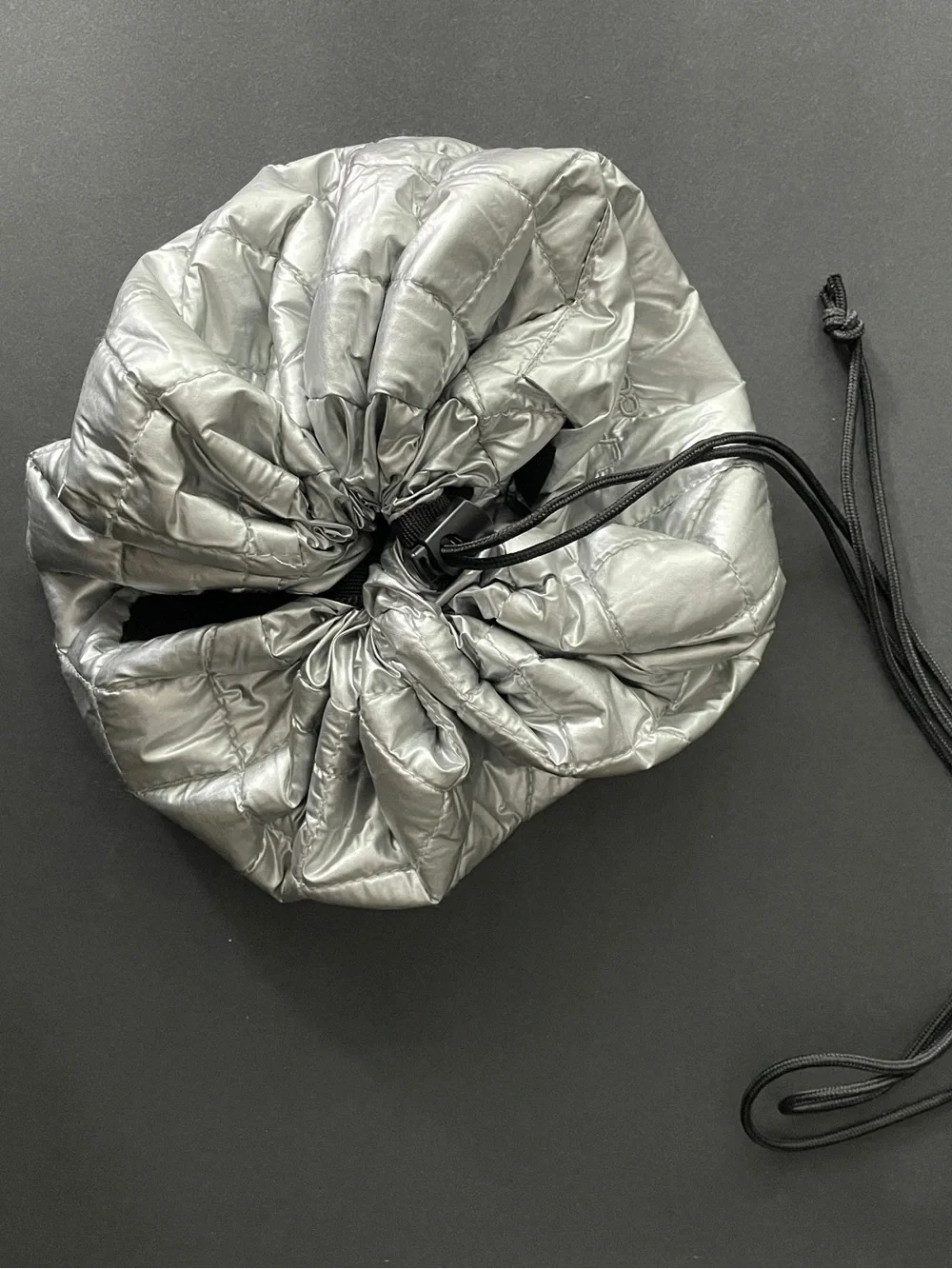 Quilted Drawstring Pouch Bag in Metallic Silver